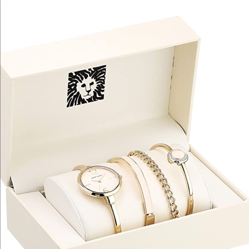 Free necklace with purchase.Gold and pink watch - Picture 2 of 3